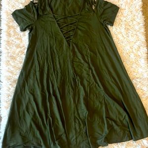 Flowy green dress with criss cross cut outs